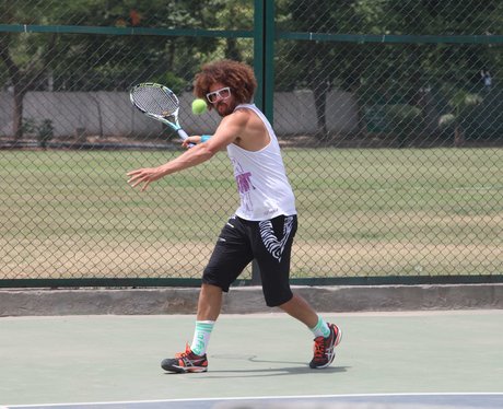 Redfoo playing tennis