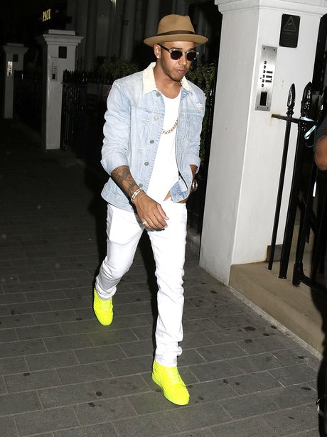Lewis Hamilton wearing flurorescent trainers