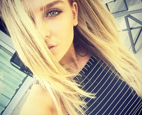 Perrie Edwards taking a selfie