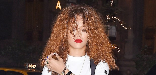 Rihanna with curly hair 
