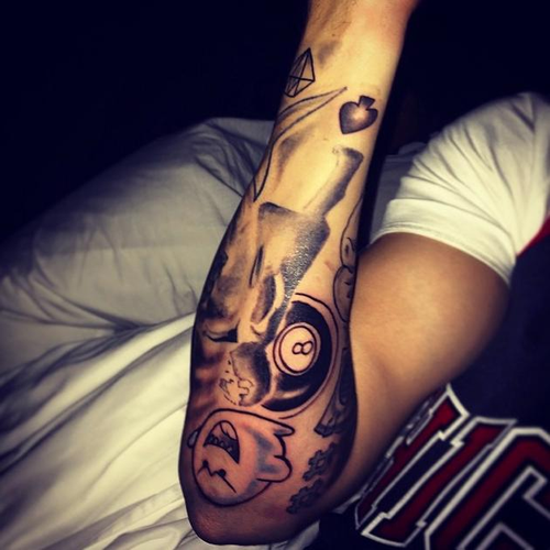 Justin Bieber Tattoo Guide And Meanings From New Face Tattoo To