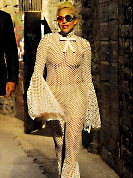 Lady Gaga wearing a nude bodsuit