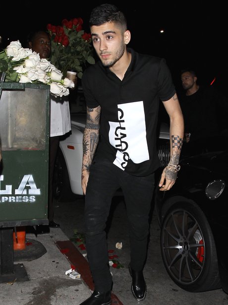 Zayn Malik celebrating his record deal