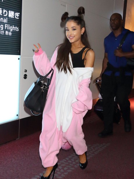 Ariana Grande wearing a onesie with heals
