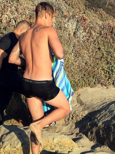 Justin Bieber on the beach in Malibu in his boxers