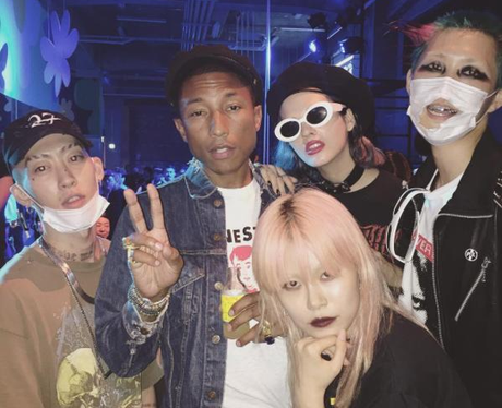Pharrell Williams with people in Tokyo