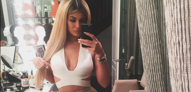 Kylie Jenner Shuts Down Boob Job Rumors, Explains How She Boosts