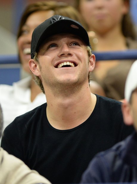 Niall Horan watching the tennis