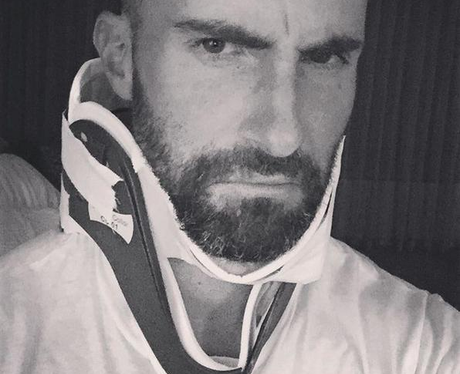 Adam Levine in neck brace instagram
