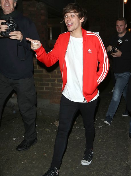 Louis Tomlinson points the finger at paparazzi after his night out in ...