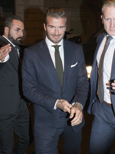 Davud beckham wearing a suit