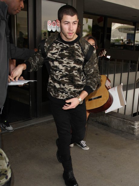 Nick Jonas Camouflage Jumper Airport