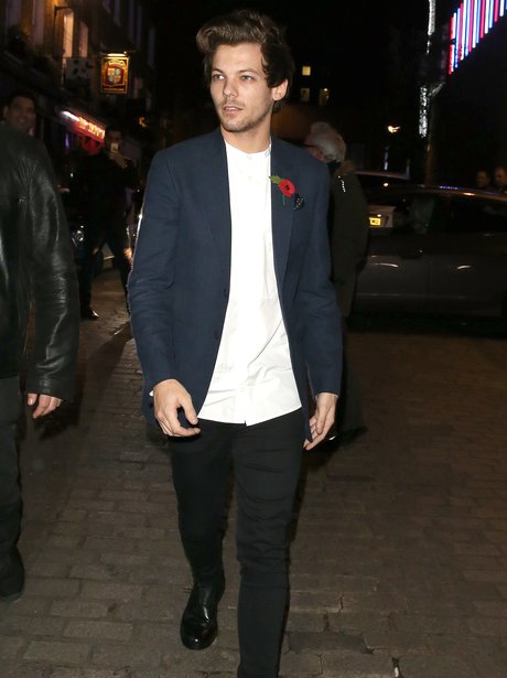 Celebrating the end of an era! 1D's Louis Tomlinson heads for a night ...