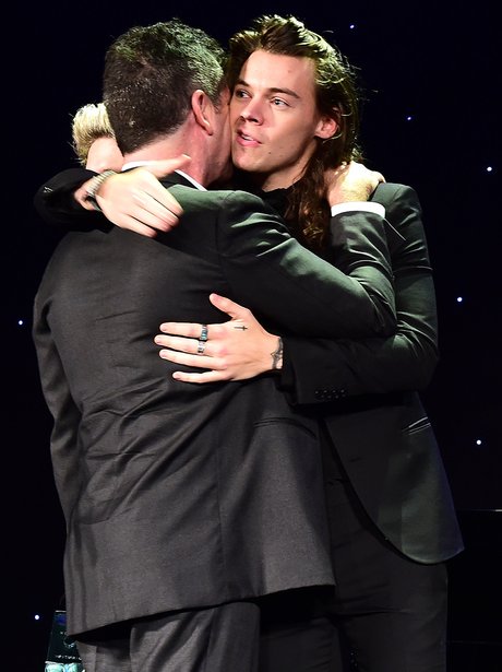 Simon Cowell and Harry Styles Hug