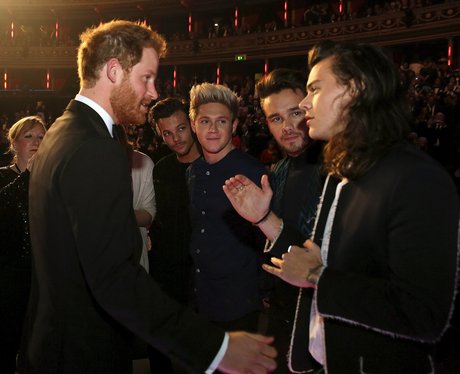Prince Harry greets members of One Direction afte