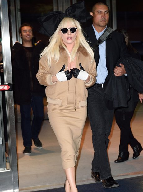 Lady Gaga in a tan outfit