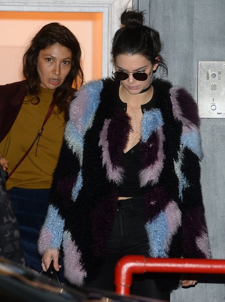 Kendall Jenner handing food to the Homeless