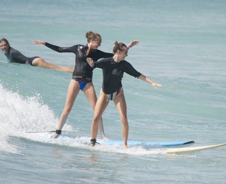 Cara Delevingne Suki Waterhouse surfing