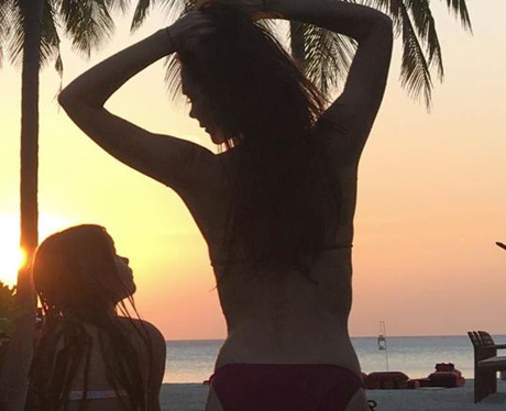 Victoria Beckham and Harper hoilday beach on insta