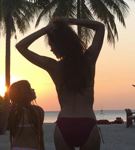 Victoria Beckham and Harper hoilday beach on insta