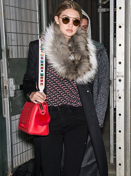 Gigi Hadid braces the FREEZING New York temperatures in stylish outfit during Fashion Week .