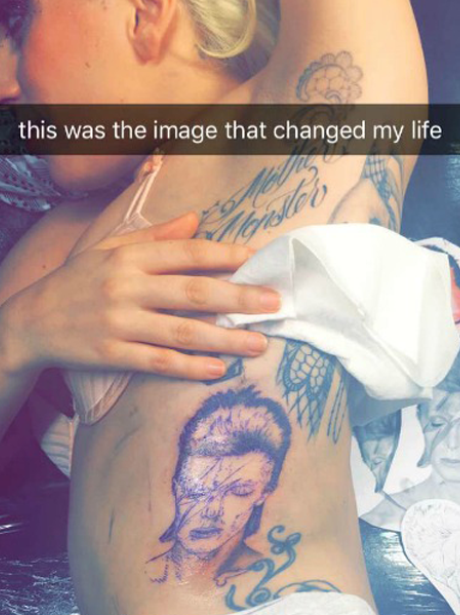 Lady Gaga's only gone and got David Bowie's face tattooed on her side in tribute to the late star.