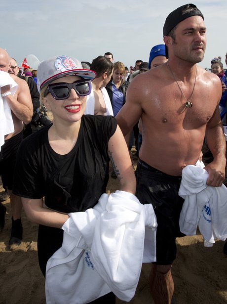 Lady Gaga and fiance take part in polar plunge