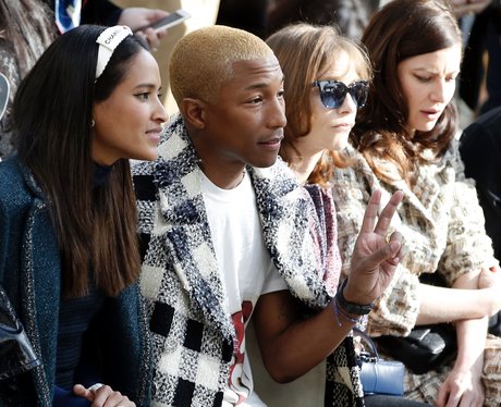 Pharrell Williams and wife FROW during Paris Fashi