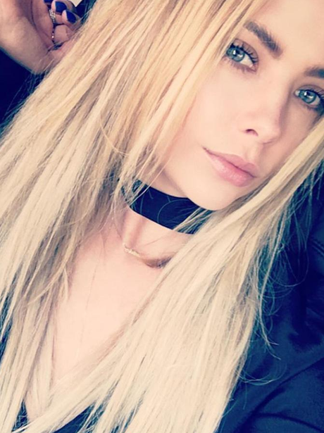 Ashley Benson poses ahead of Pretty Little Liars s