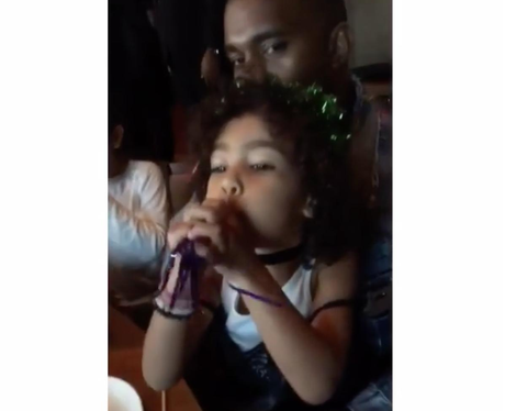 Kanye West shows off his paternal side in fatherly