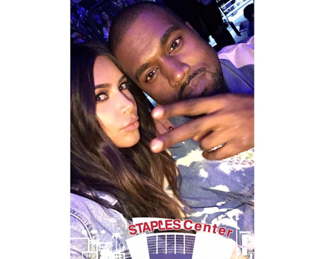 Kim Kardashian and Kanye West head to Beiber's con