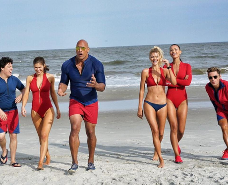 Baywatch cast walk along the beach