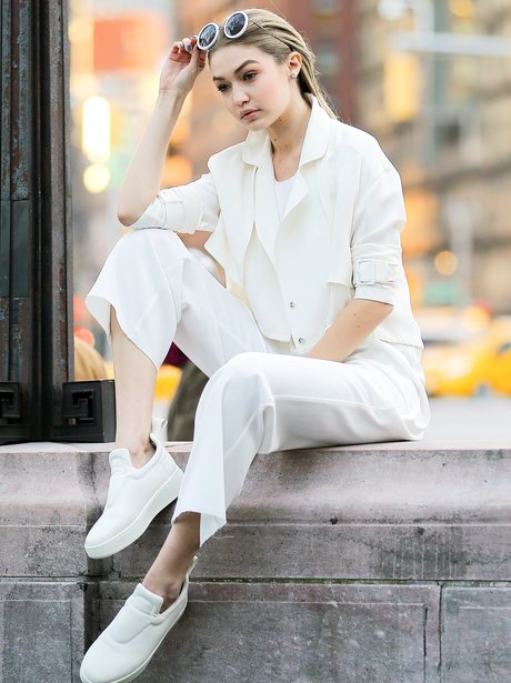 Gigi Hadid poses on set of new Maybelline campaign