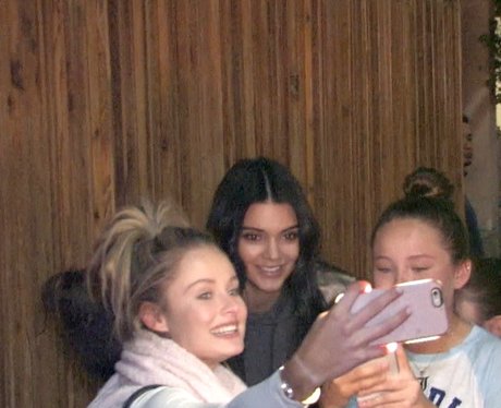 Kendall Jenner poses for selfies with fans
