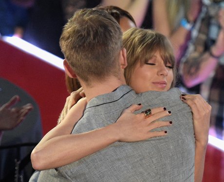 Taylor Swift hugs boyfriend, Calvin Harris at iHea