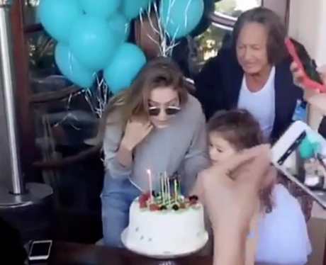 Gigi Hadid blows out the candles on her 21st birth