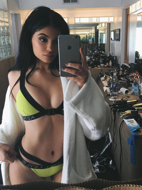 Kylie Jenner poses on set of Kendall and Kylie Swi