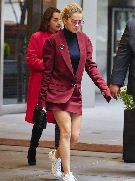 Rita Ora steps out in burgundy suit before the Met