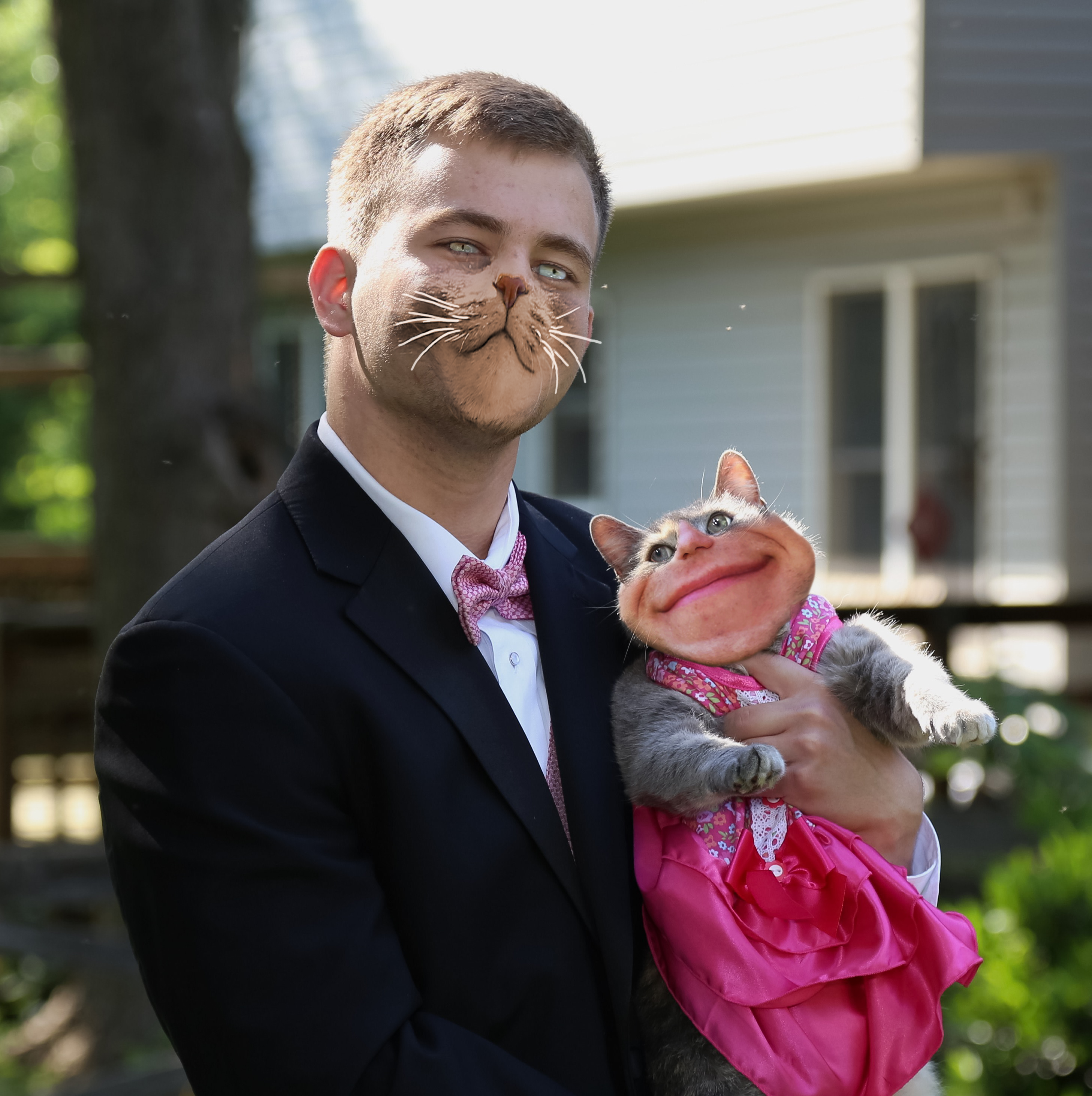 Guy takes his cat to prom