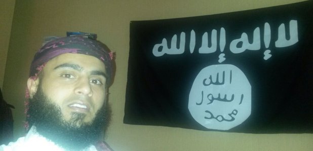 Ayman Shaukat posing with IS flag