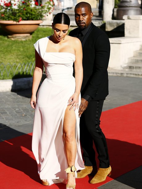 Kim Kardashian and Kanye West attend premiere in R