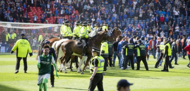 Police horses on pitch at Hampden