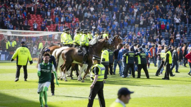 Police horses on pitch at Hampden