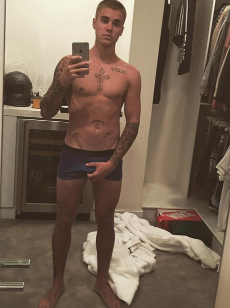 Justin Bieber poses in his Calvin Kleins