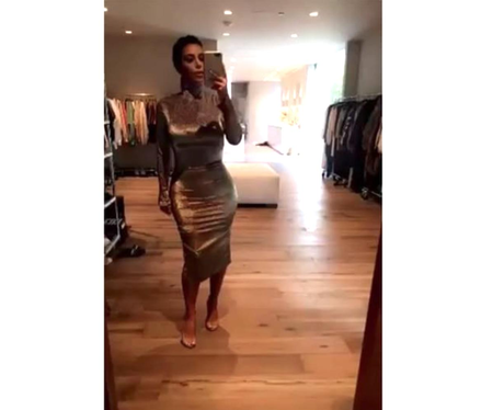 Kim Kardashian wows in silver dress