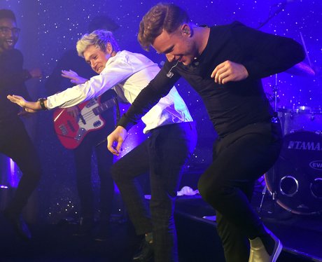 Niall Horan and Olly Murs dance on stage