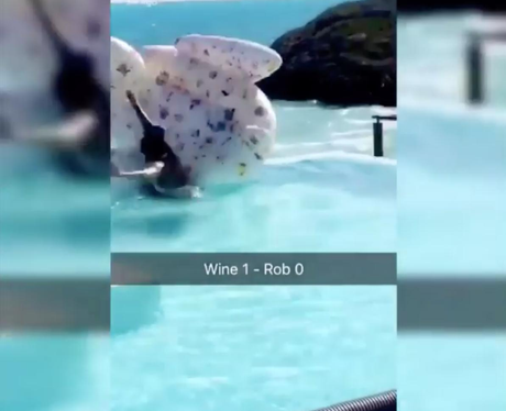 Rihanna falls off her inflatable swan