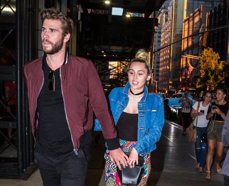 Miley Cyrus and Liam Hemsworth hold hands after di