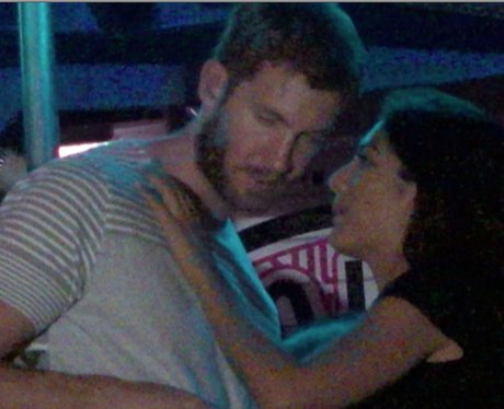Calvin Harris gets cosy with mystery lady
