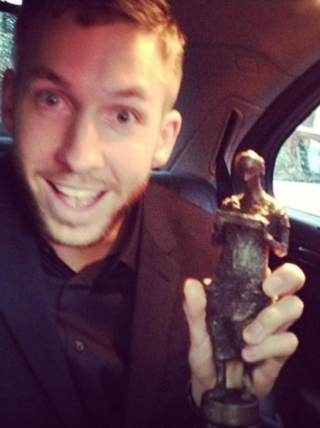 Calvin Harris poses with 2013 Ivor Novello awards